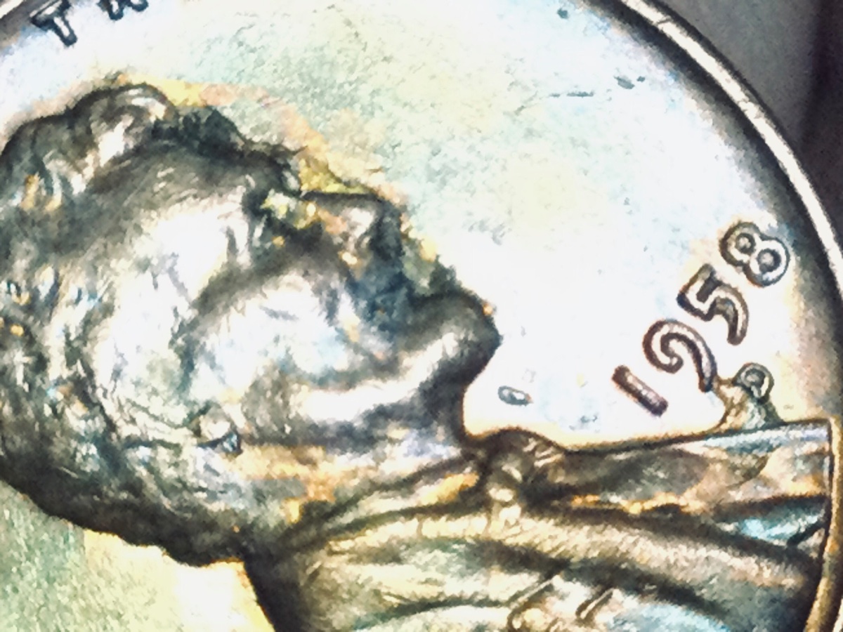 1974-Lincoln-Cent-Possible-Strike-Through-Error?
