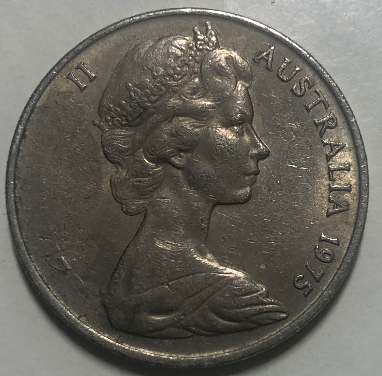 Is-This-1975-20-Cent-An-Error-Or-Post-Mint-Damage?