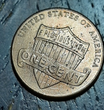 2014-Penny-With-Many-Holes-Front-&-Back