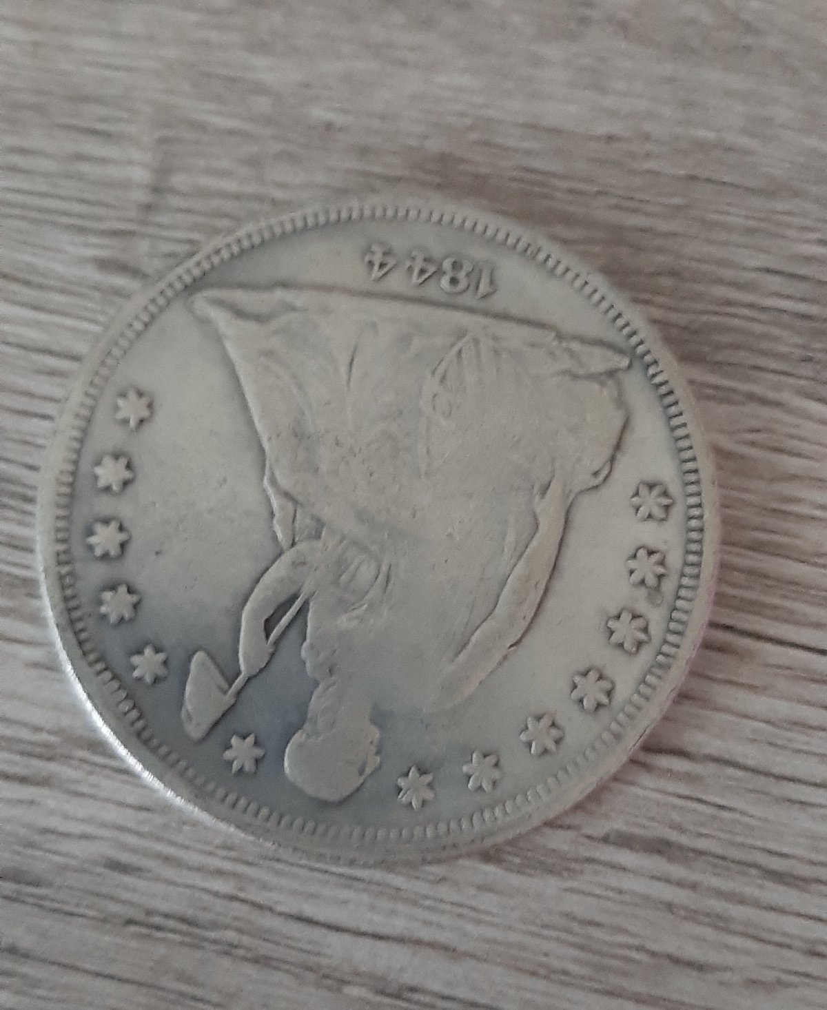 1844-Seated-Liberty-Dollar