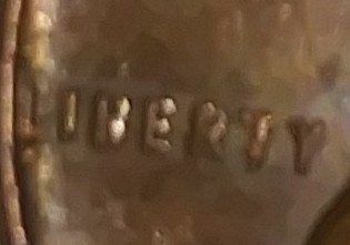 1957-D-Wheat-Penny-Die-Cud-On-Reverse
