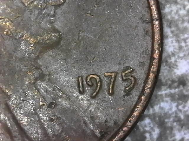 Tilted-5-In-The-Date-Of-A-1975-Penny