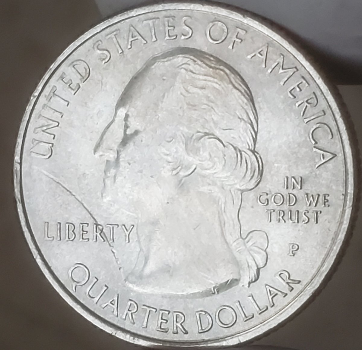 2018-Quarter-Struck-Through-Large-Rim-Burr