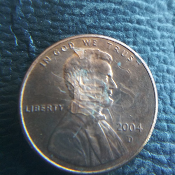 2004-D-Cent-Counterfit-Or-Error?-Part-Of-The-Memorial-Building-Is-On-Abe's-Face