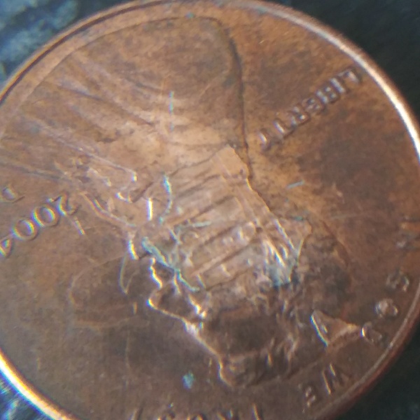 2004-D-Cent-Counterfit-Or-Error?-Part-Of-The-Memorial-Building-Is-On-Abe's-Face