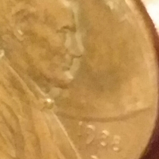 1988-D-Lincoln-Penny-With-A-Size-Of-A-Penny-On-Part-Of-Lincoln's-Head-Obv