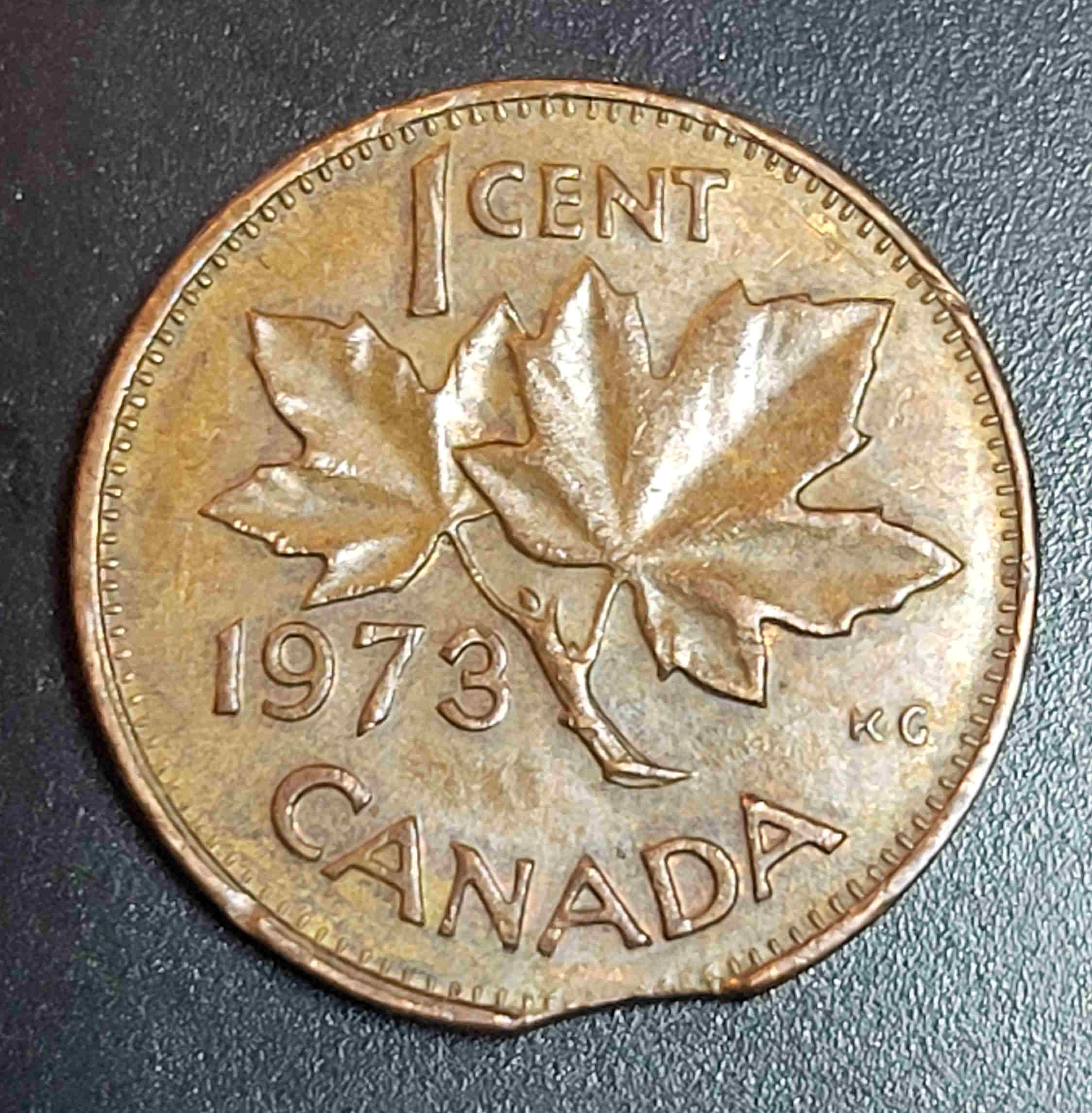 Clipped-Planchet-On-1973-Canadian-1-Cent--?