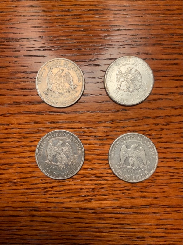 1875-And-1877-Trade-Dollars