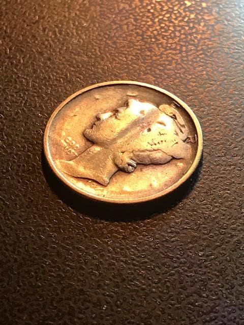 Mercury-Dime-Stuck-Through?