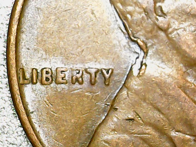 1944-Lamination-Peeled-Neck-And-Misplaced-Hair-Curl-Cent