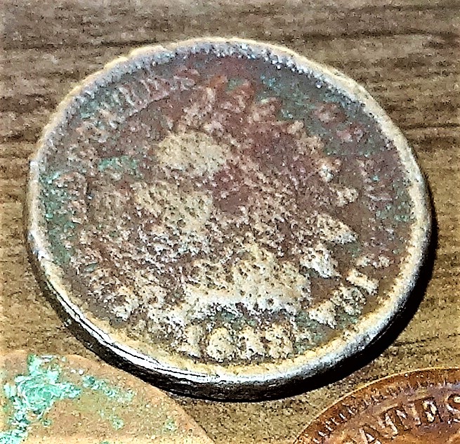 I-Need-Help-Identifying-An-Indian-Head-Coin-With-A-Bad-Date.