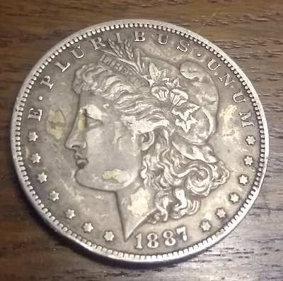 New-Collector-Common-1887-O-Morgan-Dollar-QuestionS