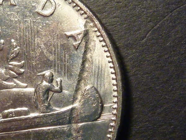 1976-Nickel-Dollar,-Struck-Through-Braided-Twine