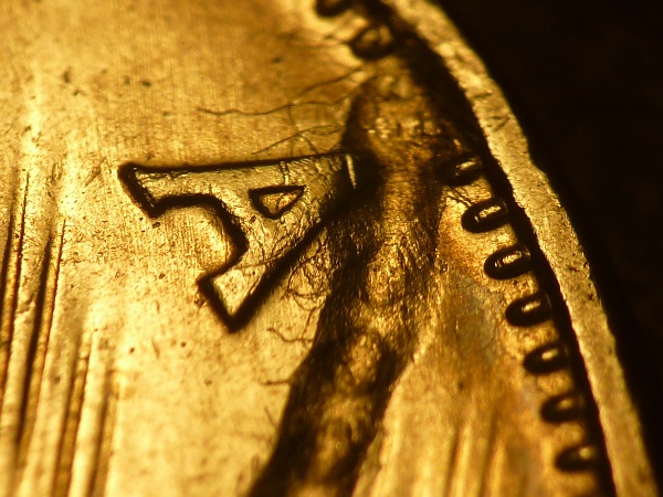 1976-Nickel-Dollar,-Struck-Through-Braided-Twine