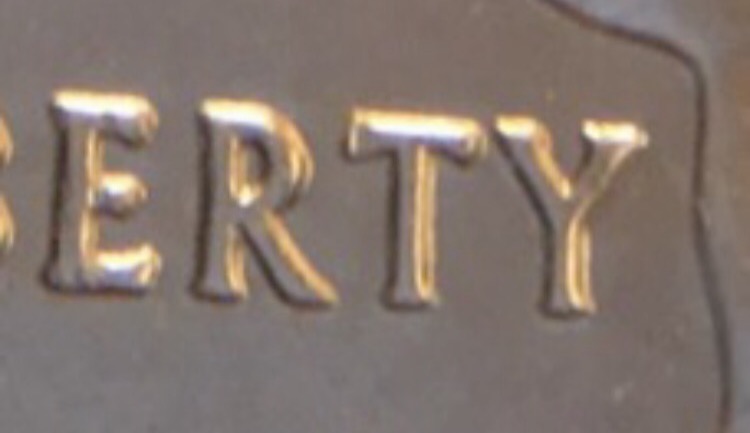 2002-Quarter-Doubled-Die?--Also-Something-In-Between-The-