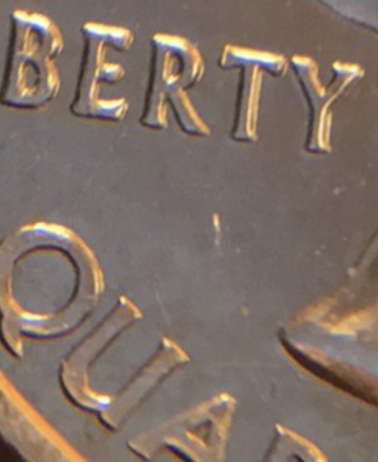 2002-Quarter-Doubled-Die?--Also-Something-In-Between-The-