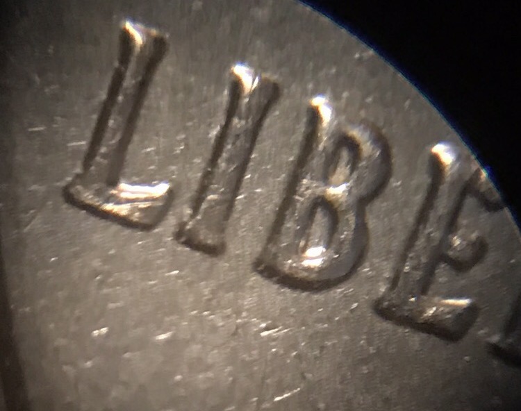 2002-Quarter-Doubled-Die?--Also-Something-In-Between-The-