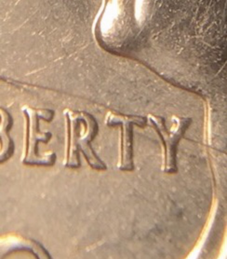 2nd-2002-Quarter-Doubled-Die?--Also-Something-In-Between-The-