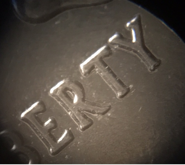2nd-2002-Quarter-Doubled-Die?--Also-Something-In-Between-The-