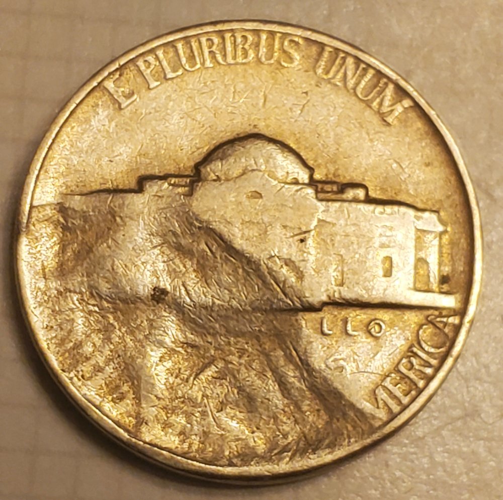 1957-P-Jefferson-Nickel-Massive-Strike-Through-Error