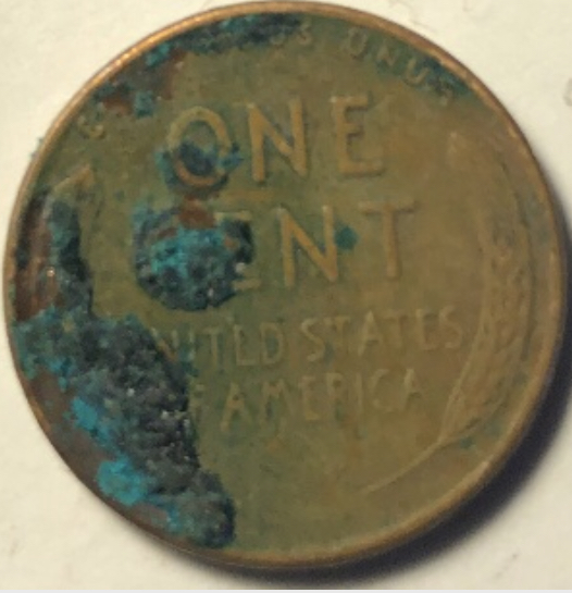 1957-D-Lincoln-Wheat-Penny-Strike-Through-Or-Lamination?