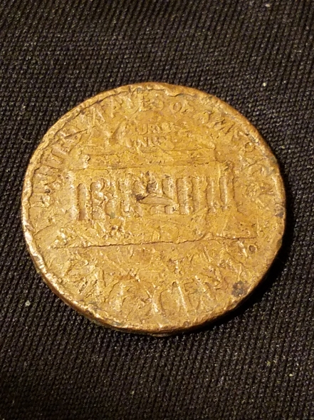 1967-Lincoln-Cent-Road-Damage?