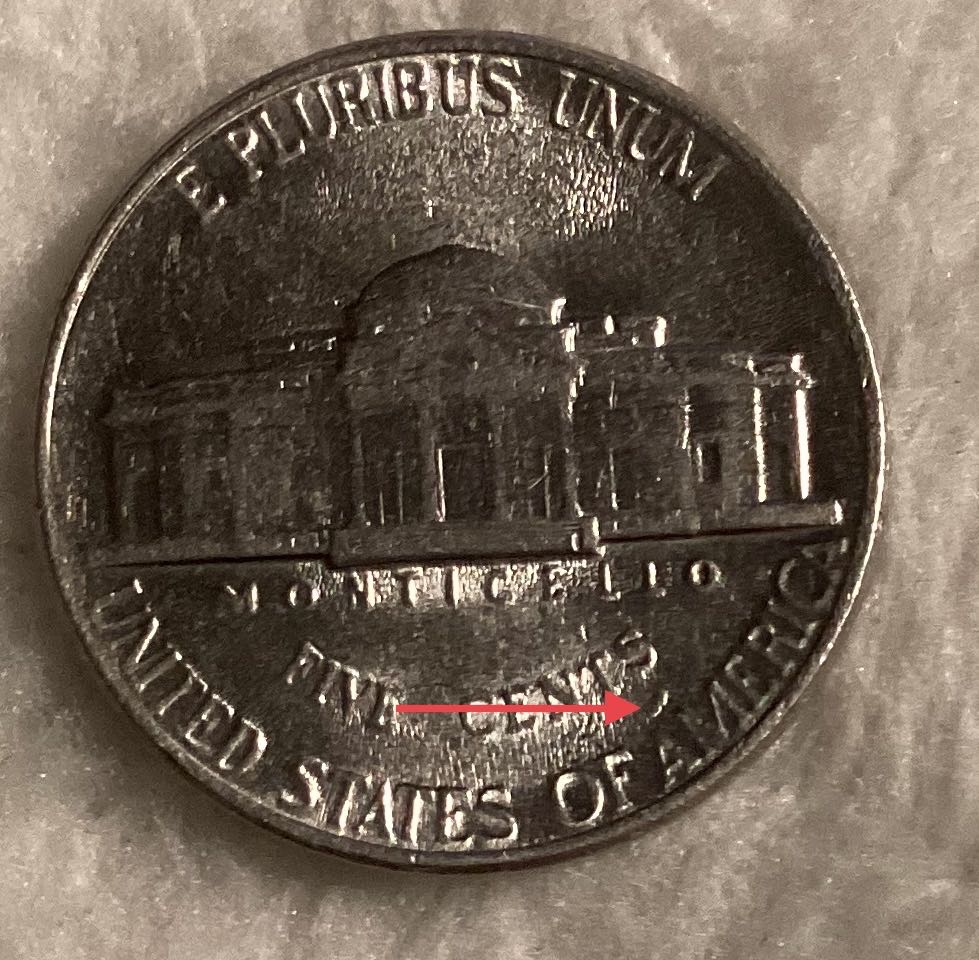 Can-Someone-Tell-Me-What's-On-This-1989-Dmint-Nickel