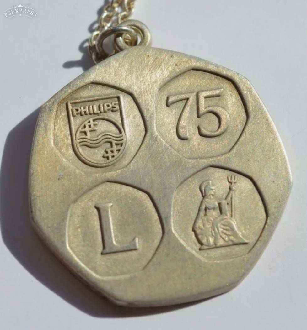 Any-Infomation-On-This-7-Sided-Silver-Token-Linked-With-Phillips?