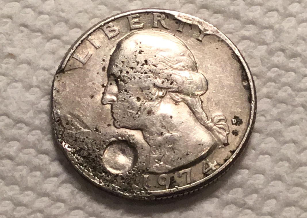 Mint-Error-Or-Post-Production-Damage-1974-Quarter