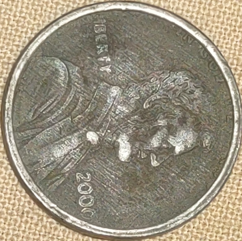 Strange-2000-Penny-?