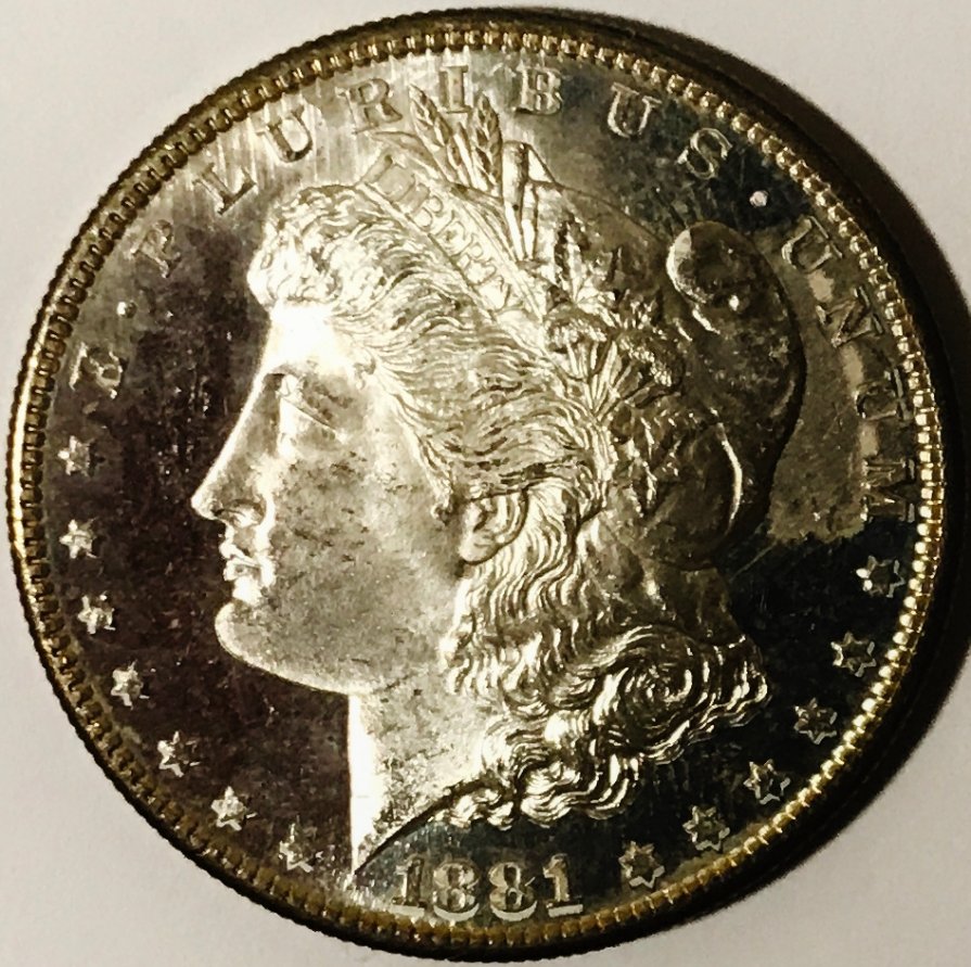 Please-Help:-What's-This-Coating-Of-...-?-On-1881-S-Morgan?