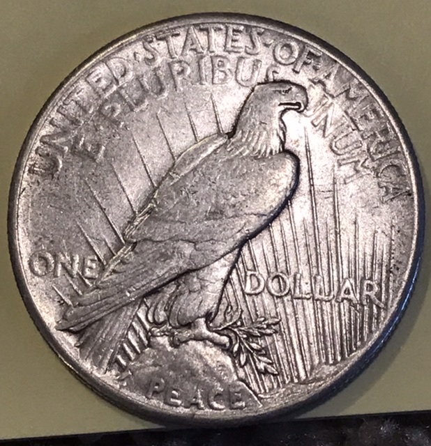 Help!-1928-Peace-Dollar---Real-Or-Altered?