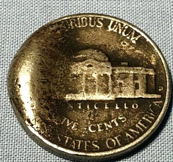 Is-This-An-Error-Or-Did-Someone-Try-To-Melt-It?-An-Ebay-Listing