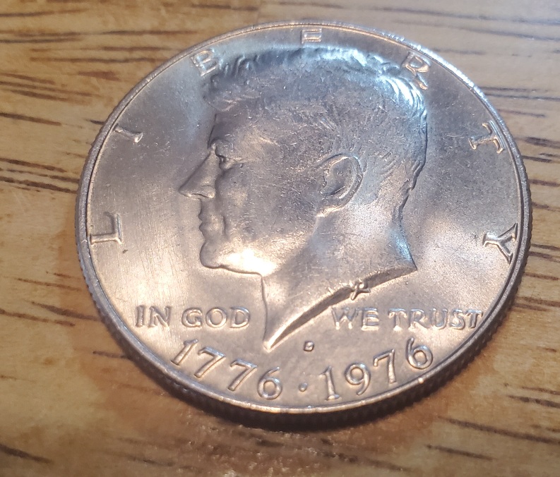 Bicentennial-Kennedy-Half-Dollar-Die-Crack?-The-Mark-Is-Raised-On-The-E-And-R-In-America