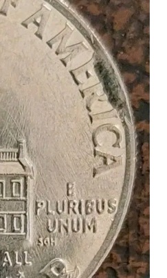 Bicentennial-Kennedy-Half-Dollar-Die-Crack?-The-Mark-Is-Raised-On-The-E-And-R-In-America