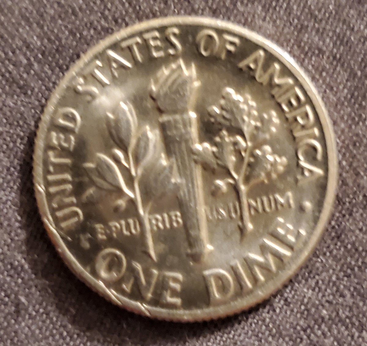 1976-D-Yellow-Tone-Dime-With-Possible-Errors.