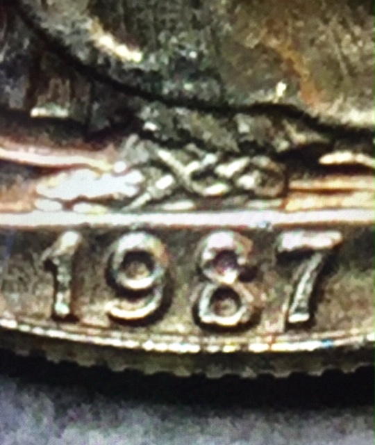 1987-WLHd.-Extra-Fingers?-Letter-Under-S-In-Trust?-American-Silver-Eagle