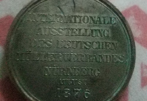 I-Need-Help-Finding-This-Coins-Name-Info-And-Value,-Id:-1876-German-Milling-Association-Medal