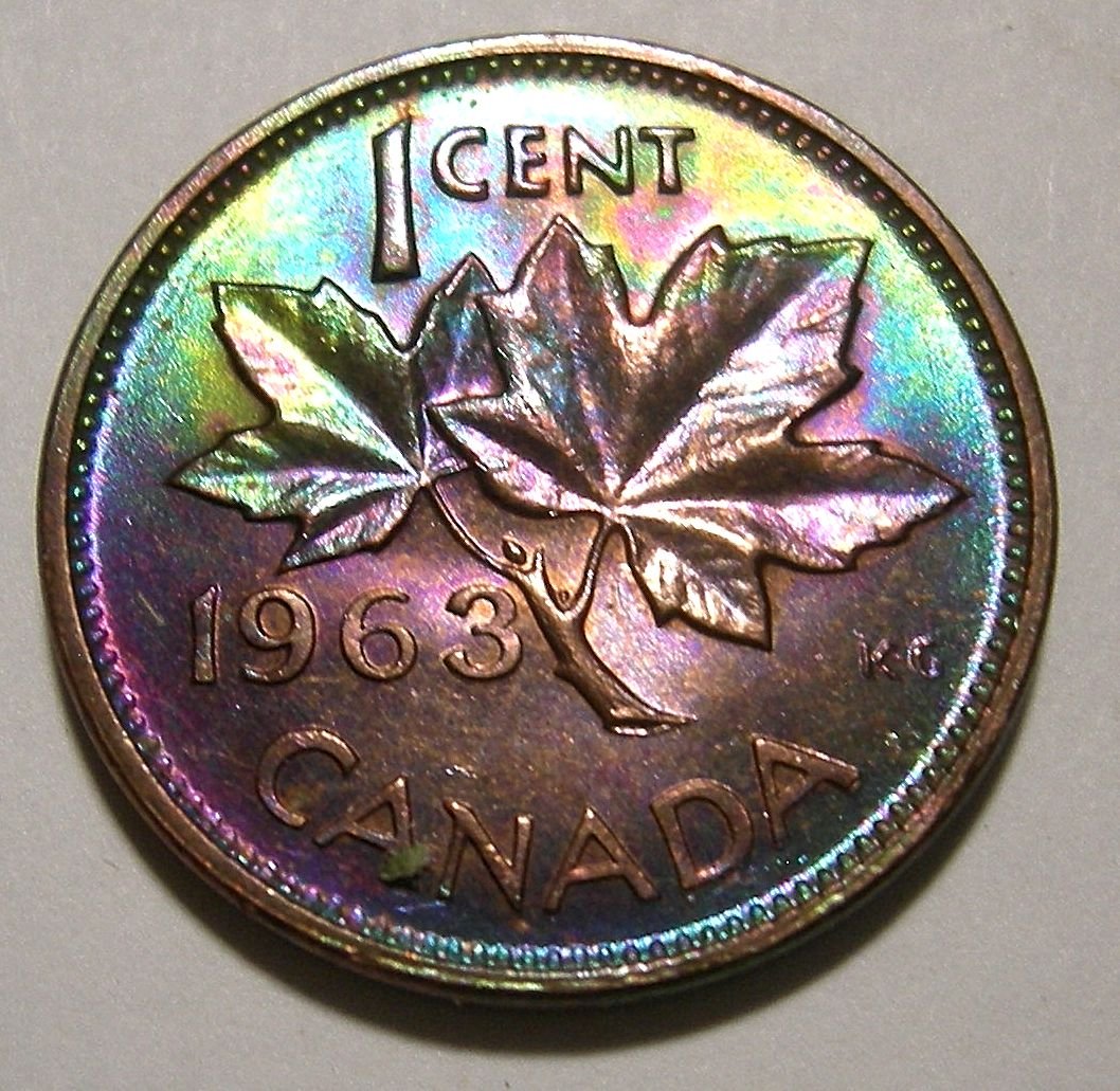 What-Could-Cause-Extreme-Shades-Of-Aqua-Blue-And-Violet-On-George-VI--Cent?