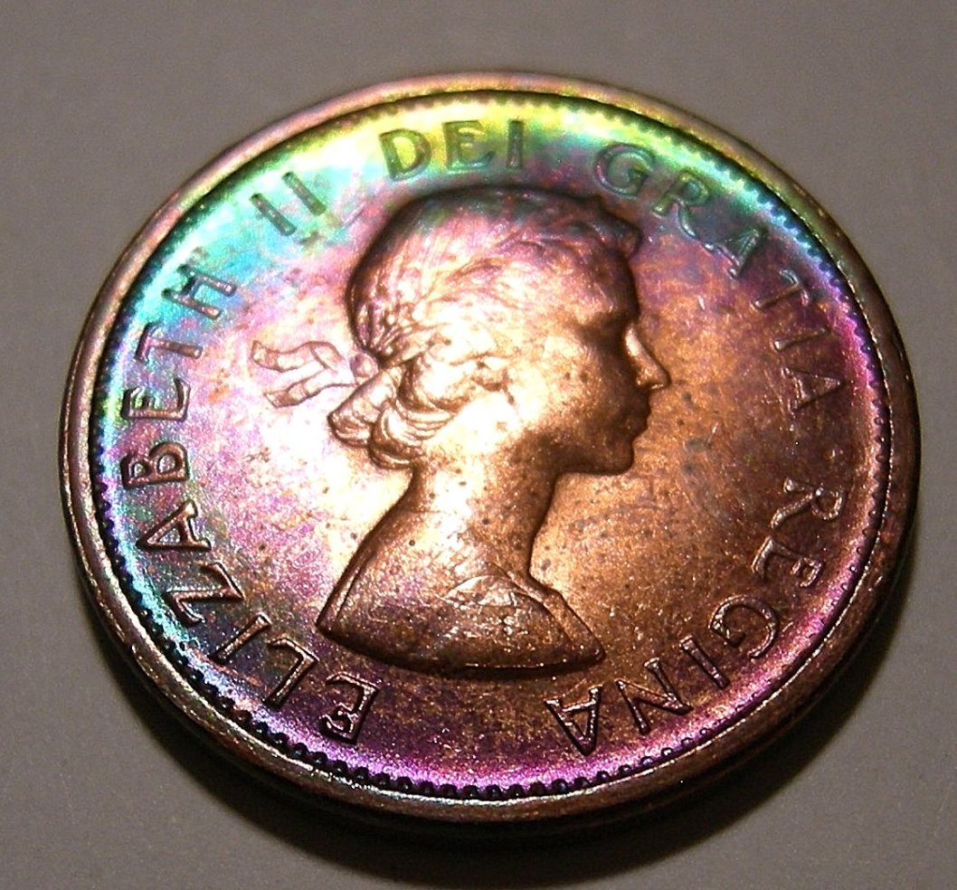 What-Could-Cause-Extreme-Shades-Of-Aqua-Blue-And-Violet-On-George-VI--Cent?