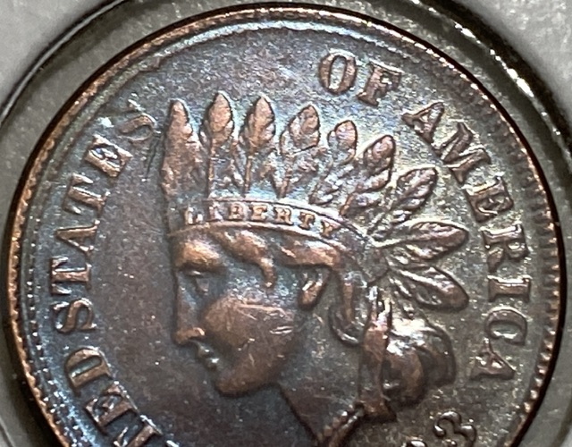 1883-Indian-Head-Off-Strike-And-Off-Colour