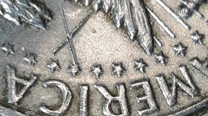 1964-Kennedy-Half-With-3-X-Shaped-Die-Crack-Marks-On-It