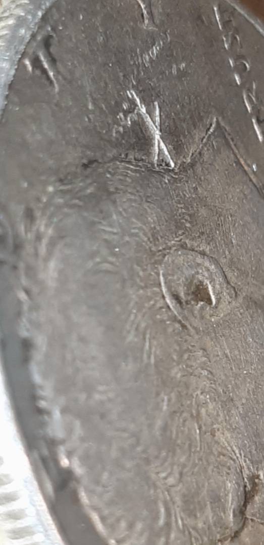 1964-Kennedy-Half-With-3-X-Shaped-Die-Crack-Marks-On-It