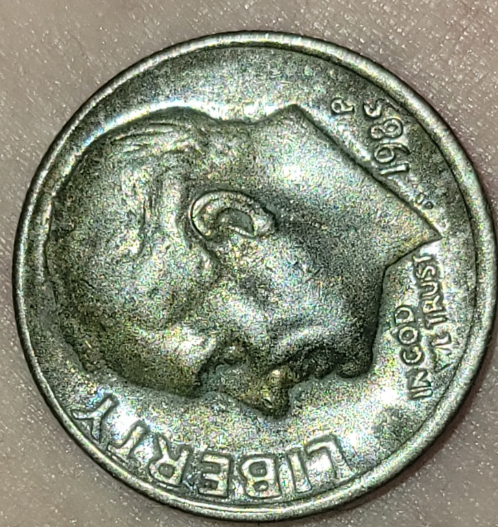 Opinions-Welcome---Is-It-Possible-To-Magnify-Too-Closely?-1985-P-Dime
