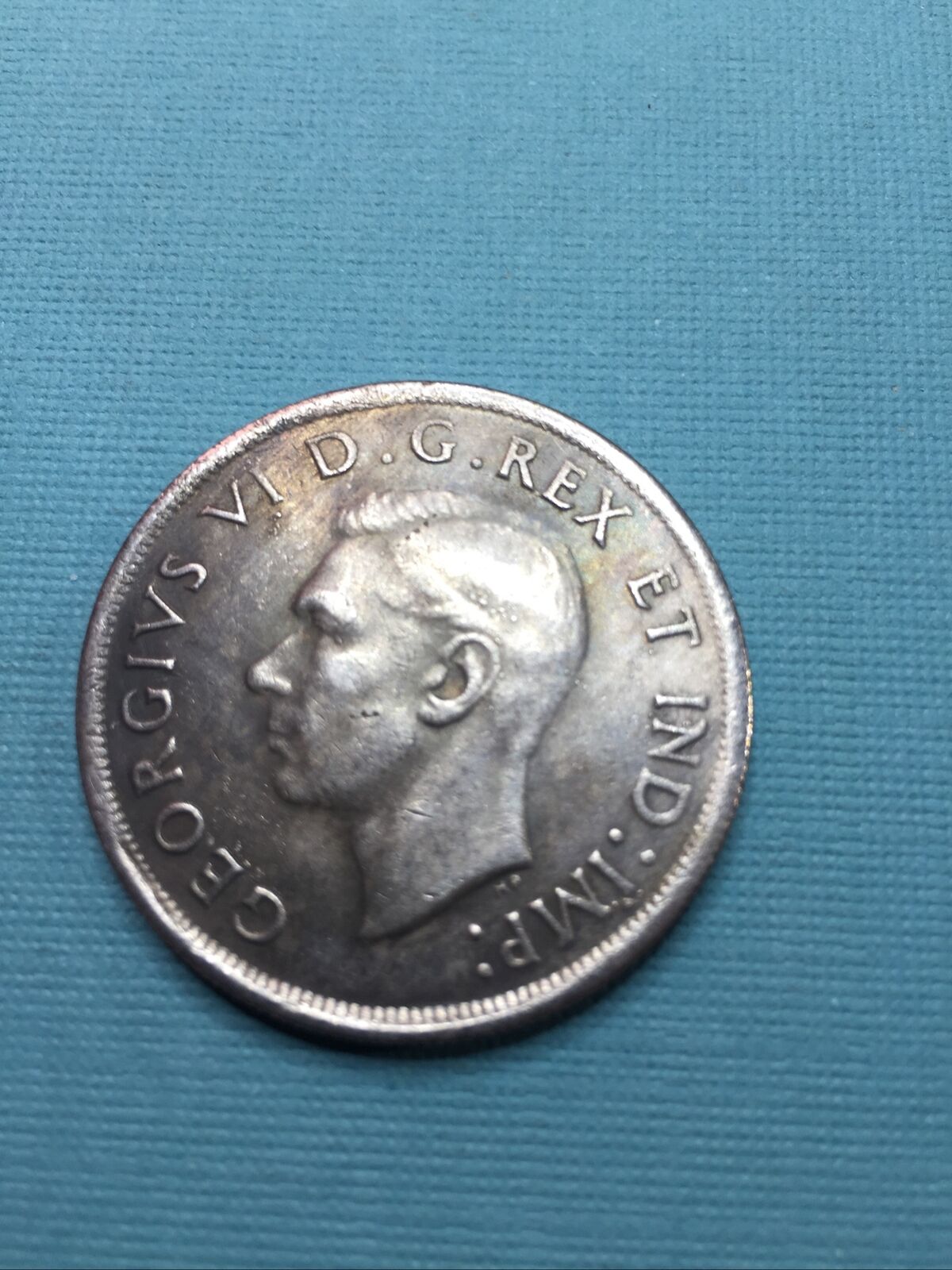 Seller-Selling-Counterfeit-1945-&-1947-Canadian-Silver-Dollars-On-Ebay