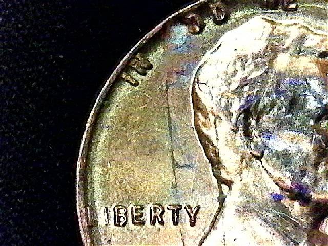 Laminations-Only-On-Circulated-Coins?