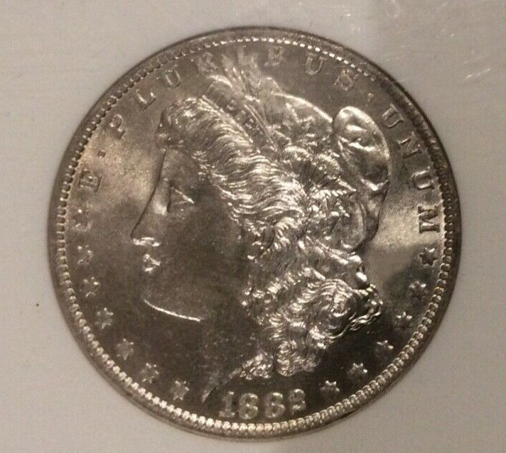 1882-O-Morgan-Dollar---You-Vs-NGC