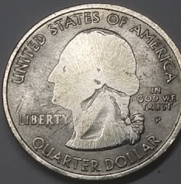 2000-New-Hampshire-Quarter-Error-Or-Damage?
