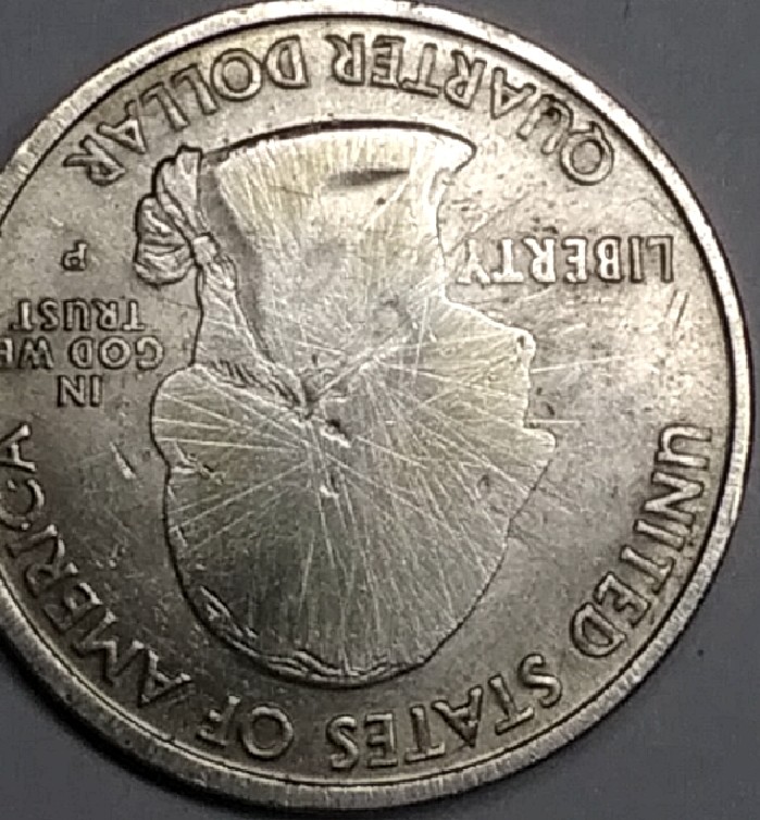 2000-New-Hampshire-Quarter-Error-Or-Damage?