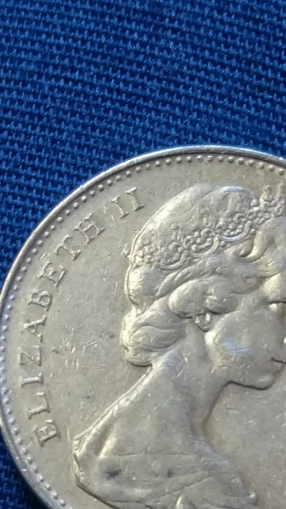 Pretty-Sure-I-Found-A-1965-High-Relief-5-Cent.